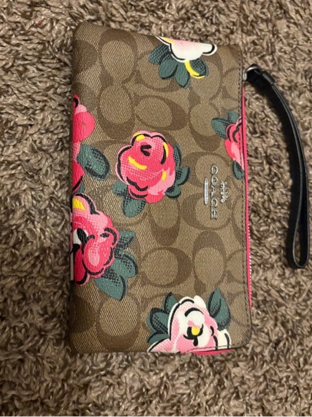 COACH Brown Signature Floral Wristlet with Pink Accents